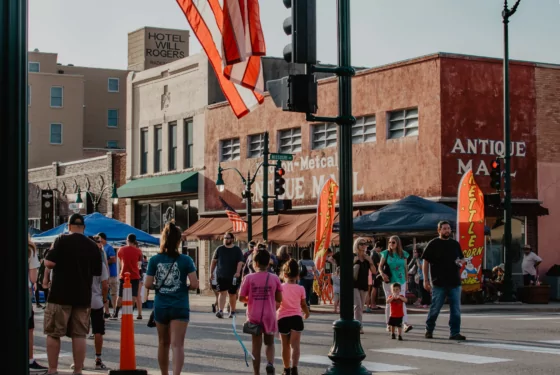 A crowd enjoys a festival outdoors in Claremore.